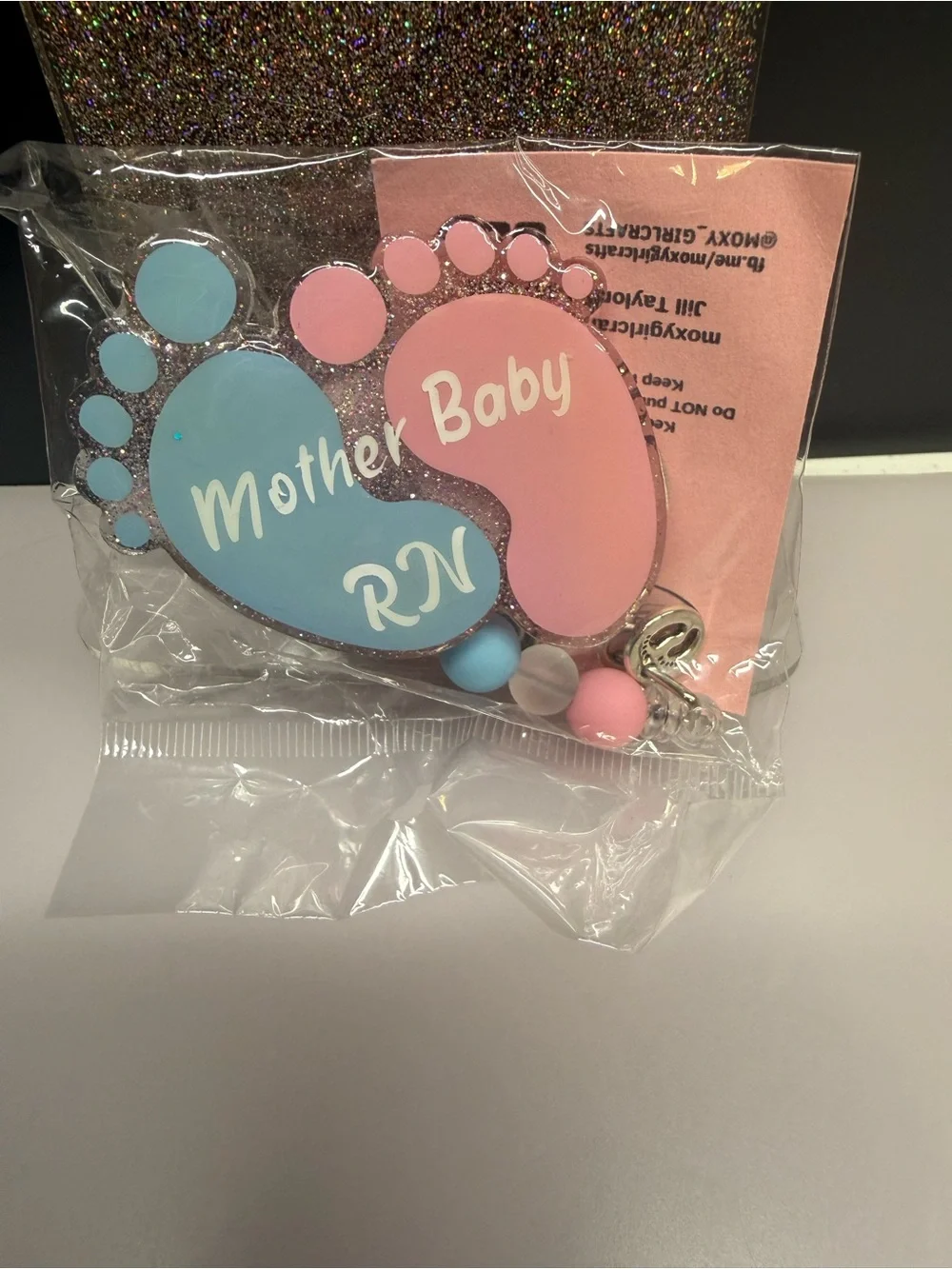 Mother Baby RN Pink & Blue Footprint badge reel
